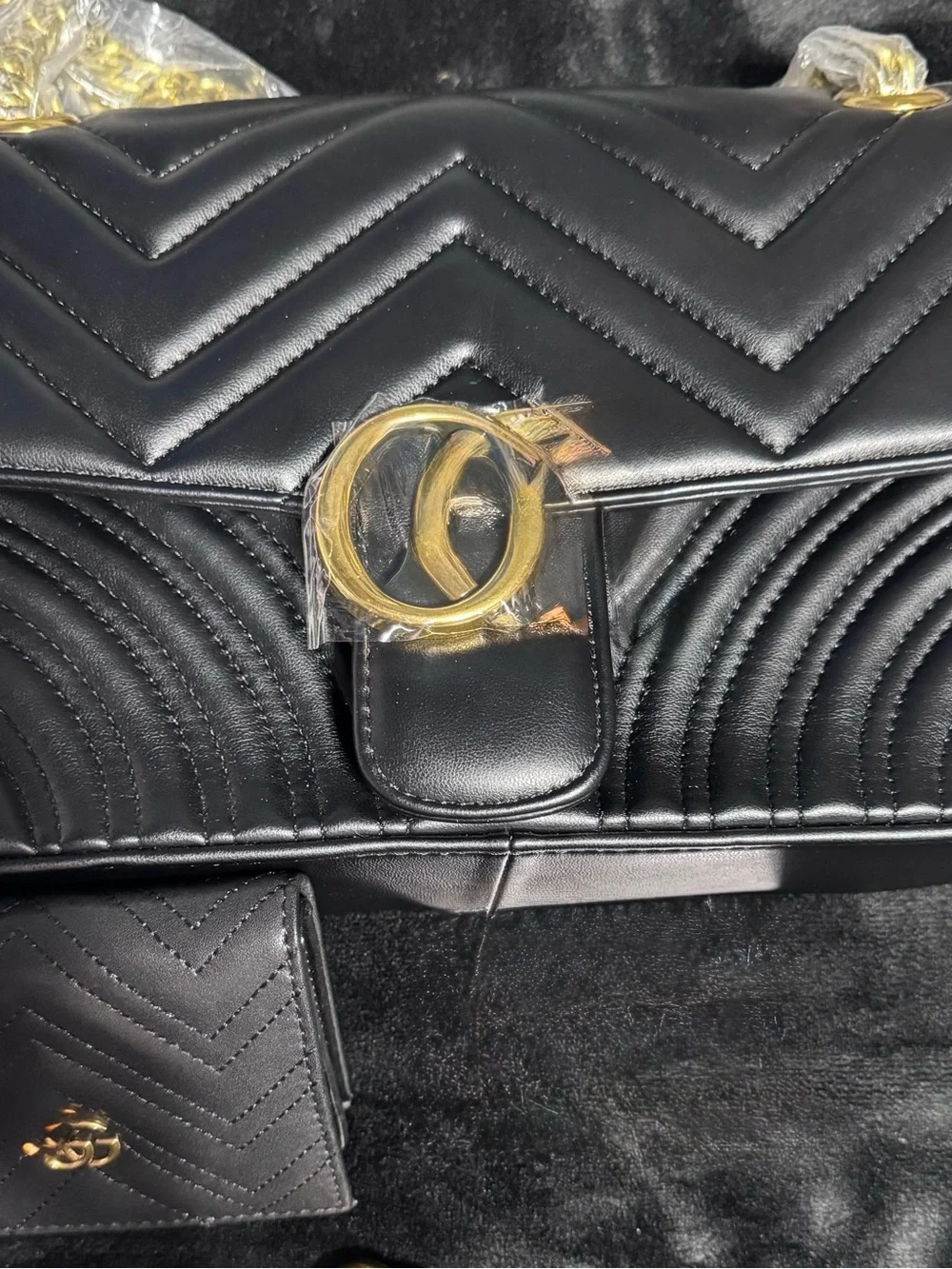 Black Quilted Shoulder Bag with Gold Hardware